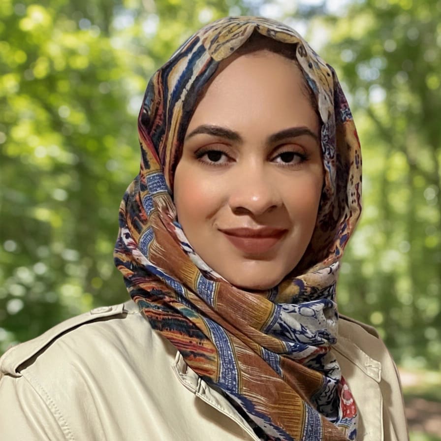 Walaa Abdalrahman wearing a colorful, earthtoned burka